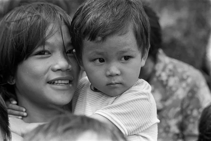 mother holding child